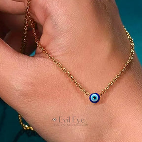 Small gold evil eye necklace